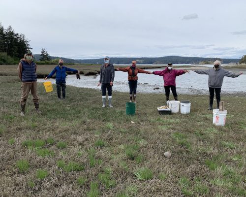 These members of the Mud Bay team make SURE they are socially distanced! Photo credit: Amy Linhart